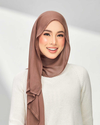 Nour in Rosybrown